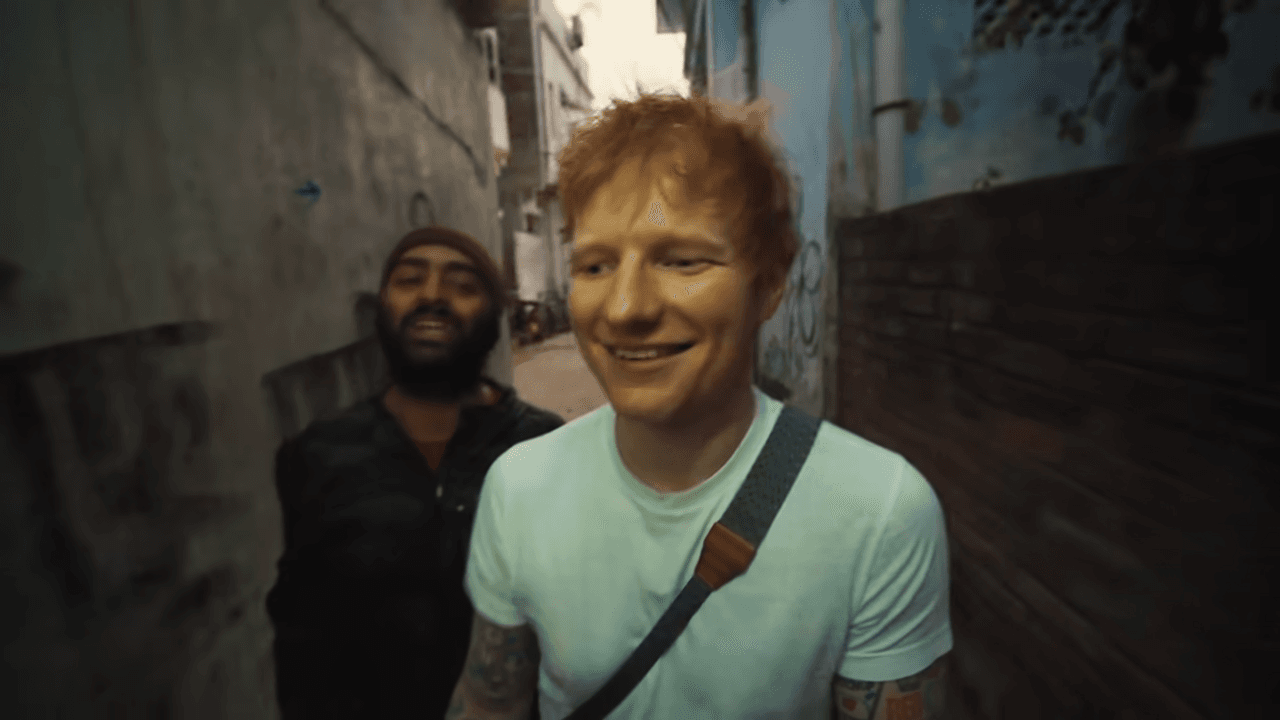 <p><em>Walking through narrow lanes. (Still from Ed Sheeran's YouTube channel)</em></p>