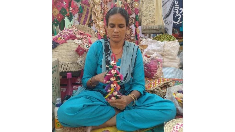 <p>An artist handcrafts Murshidabadi jute dolls. <em>(Picture by Duttasubha88, Wikimedia Commons)</em></p>