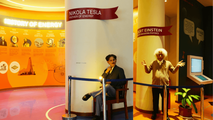 <p>Life-sized figures of Nikola Tesla and Albert Einstein stand alongside exhibits tracing the history of energy innovation.</p>