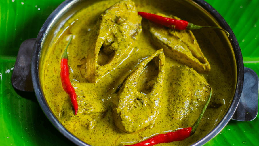 <p>The final dash of raw mustard oil is the crucial ingredient that ties Shorshe Ilish together.</p>