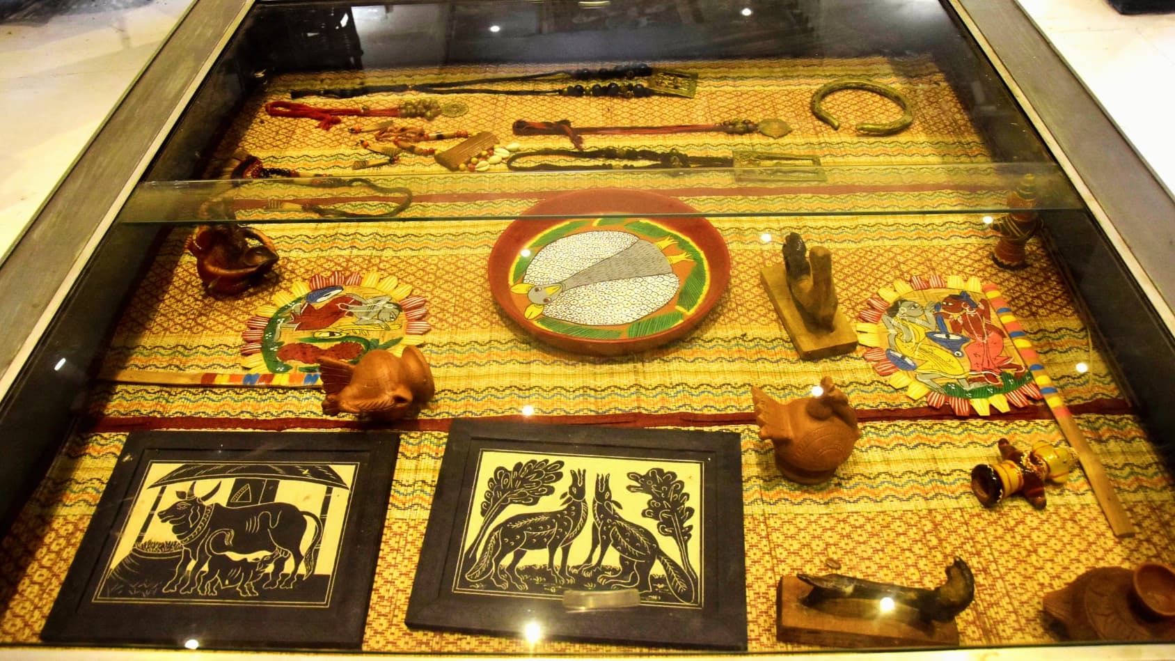 <p>A close‐up of intricate tribal artefacts celebrating craft and culture.</p>