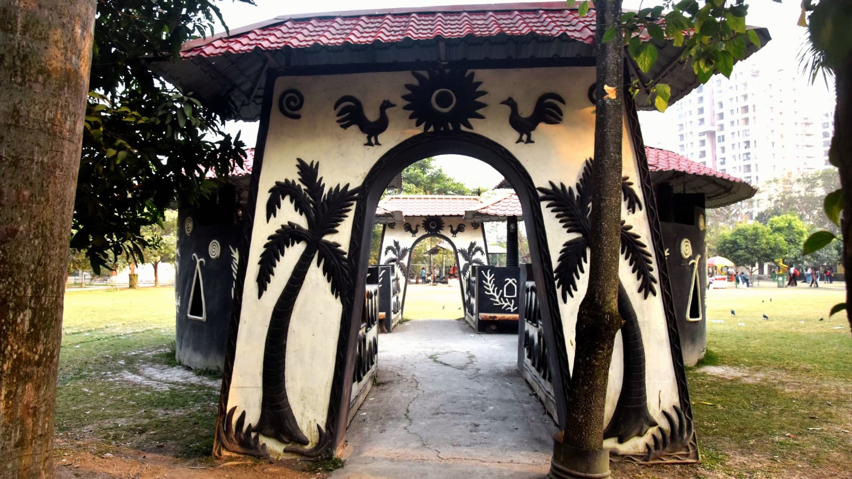 <p>This beautifully decorated archway leads visitors into the heart of the village's cultural zones.</p>