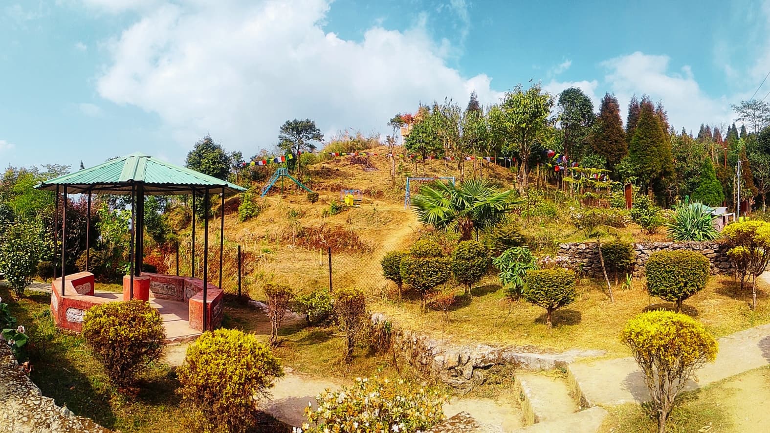 <p>A modest heritage park developed by local groups, offering shaded paths and open hillside views. (Picture by Purav Pradhan)</p>