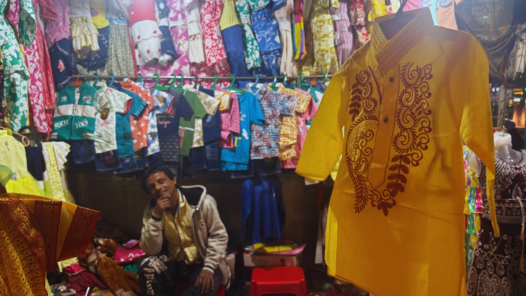 <p>Stalls spill over with&nbsp;children's clothing, from tiny kurtas and frocks to festive lehengas.</p>