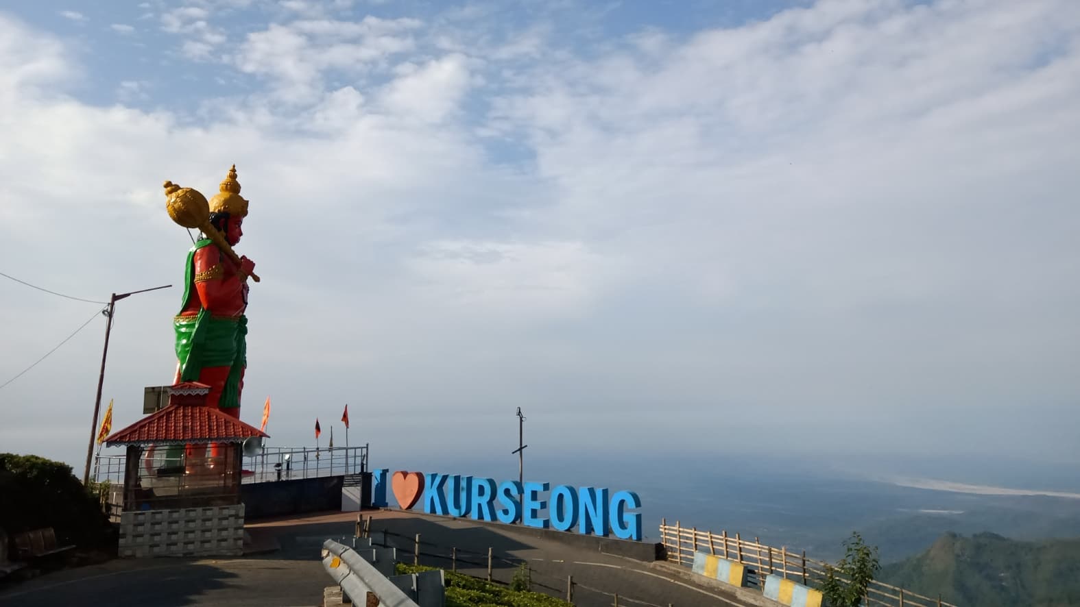 <p>A hilltop site with a Hanuman statue and views across Kurseong. (Picture by Purav Pradhan)</p>