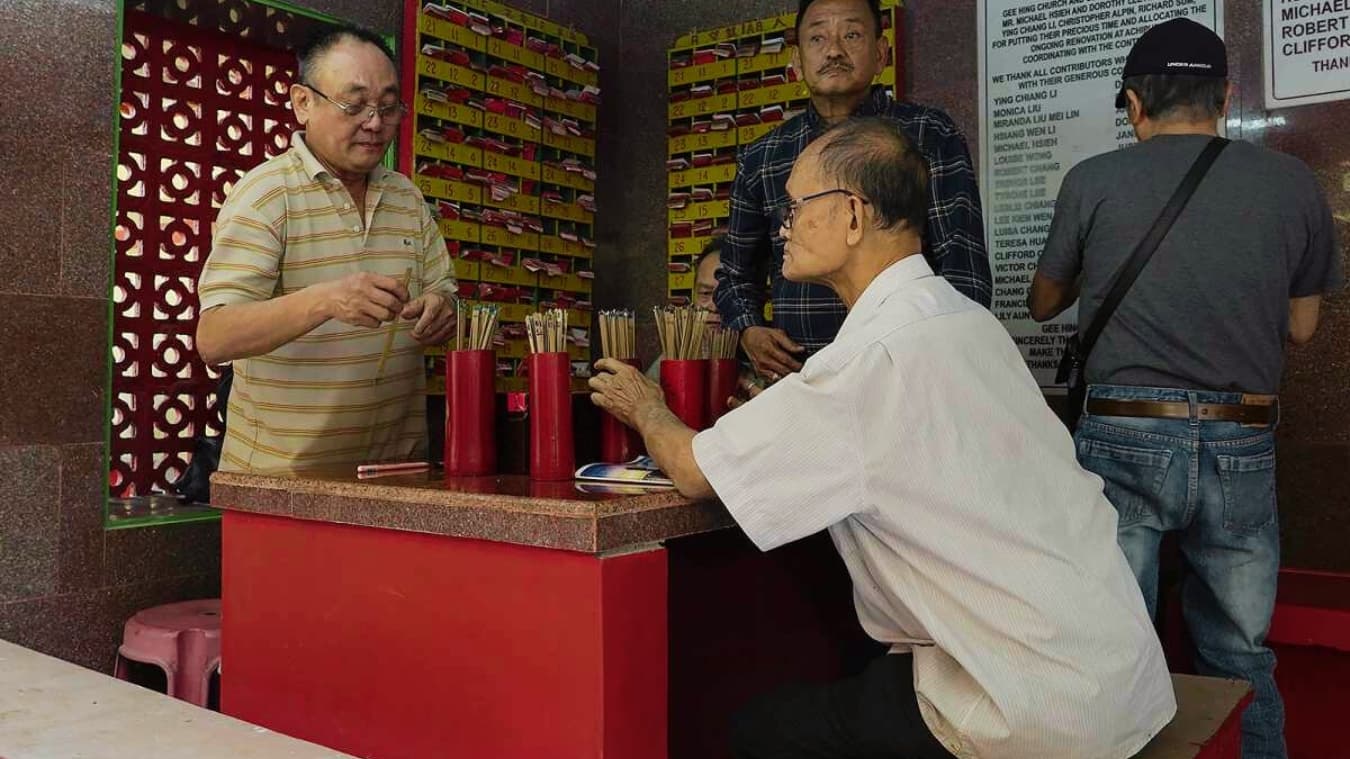 <p>Devotees practicing kau cim, the ancient art of fortune-telling.</p><p>&nbsp;</p>