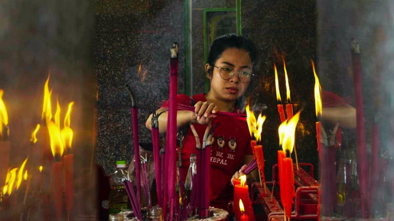 <p>Chinese devotees lighting incense sticks during their visit to the Achipur Chinese Temple.&nbsp;</p><p>&nbsp;</p>