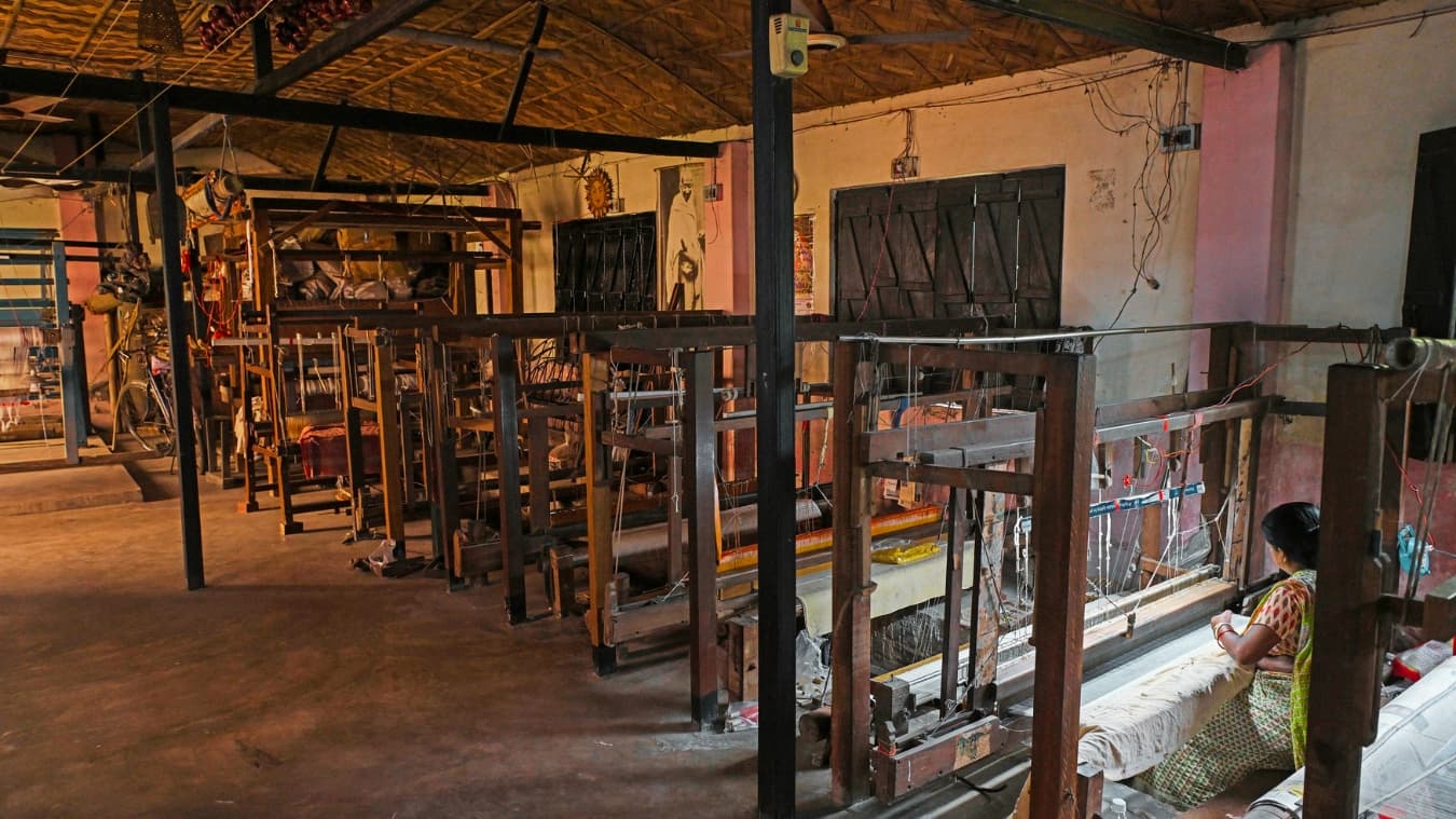 <p>The entire process requires the weaver to sit with legs hanging from the loom pit for an extended period of time.</p>