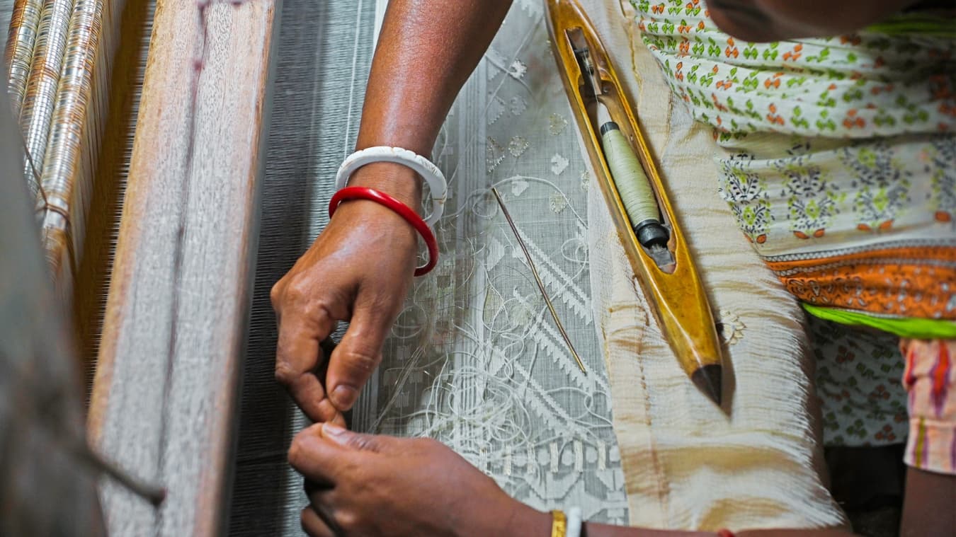 <p>“Right from spinning the threads from raw cotton to weaving the sari, everything is done by hand. Pure muslin and&nbsp;<em>jamdani&nbsp;</em>saris cannot be woven on a machine,” Jyotish Debnath reveals.</p>