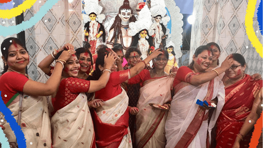 <p>Sindoor Khela on Bijoya Dashami at Adhya Bari. (Picture by Poulomee Auddy)</p>